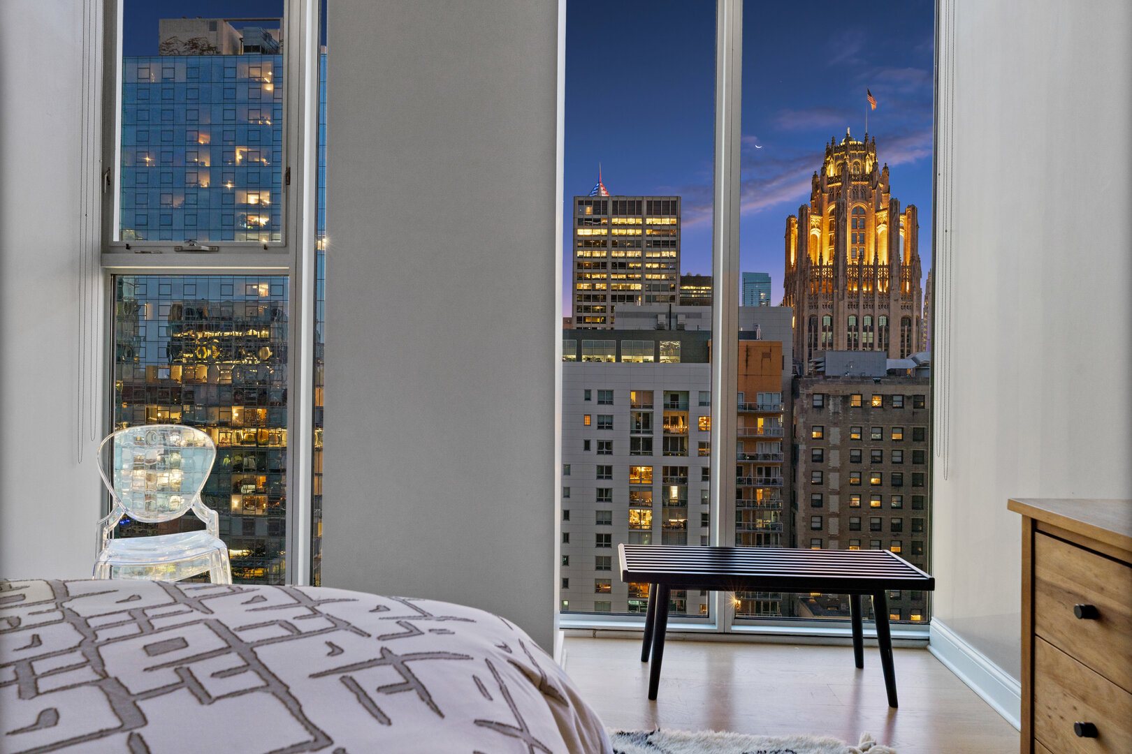 550 North St Clair Street, Unit 2502 Chicago, IL 60611 - Photo 40 of 53 a bedroom with a bed and a window