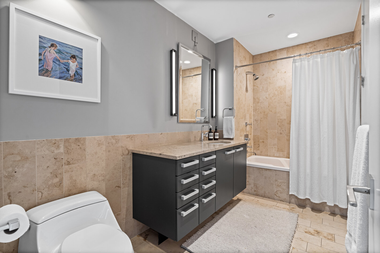 550 North St Clair Street, Unit 2502 Chicago, IL 60611 - Photo 41 of 53 a bathroom with a granite countertop sink toilet and shower