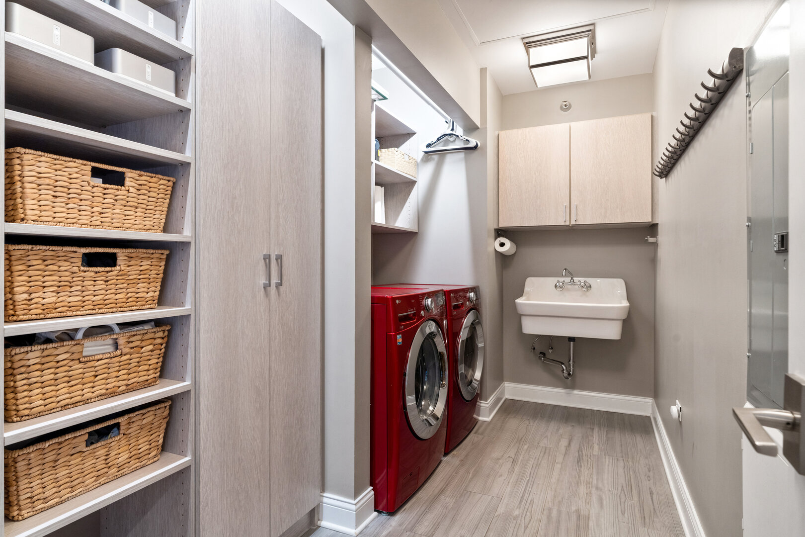 550 North St Clair Street, Unit 2502 Chicago, IL 60611 - Photo 42 of 53 a utility room with dryer and washer
