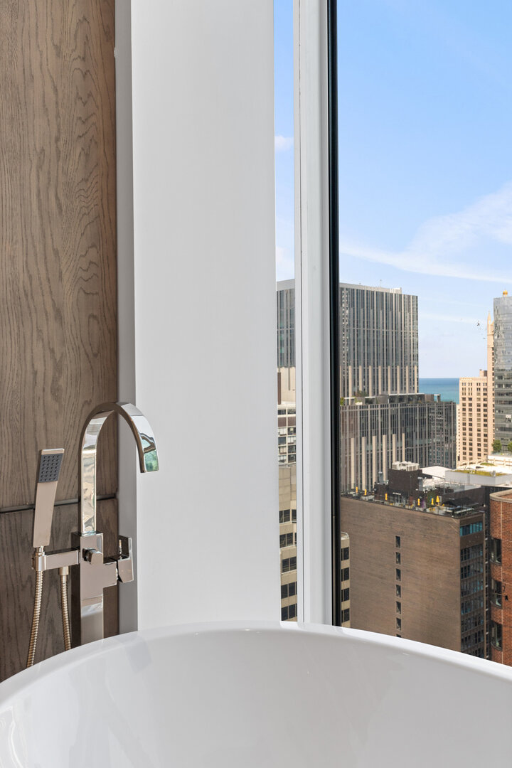 550 North St Clair Street, Unit 2502 Chicago, IL 60611 - Photo 49 of 53 view of a living room and a window