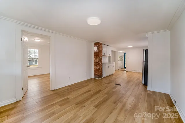 a view of a kitchen with electric appliances