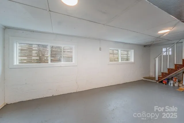a view of a balcony with wooden floor