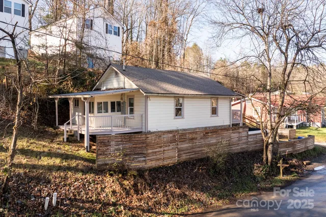 an aerial view of a town with couple of houses