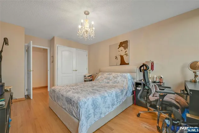 a bathroom with a shower a toilet and sink