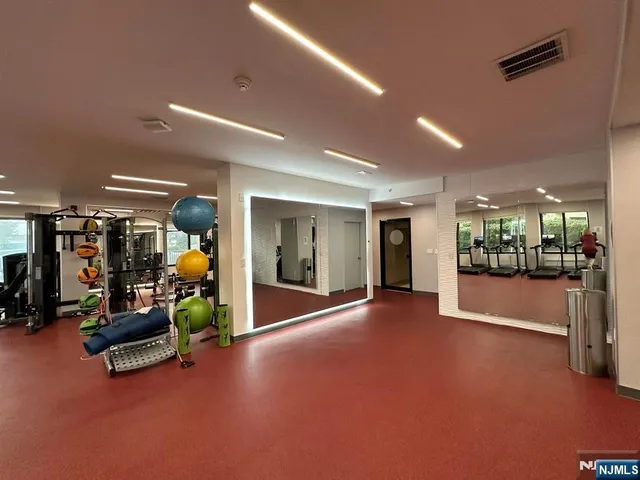 a view of swimming pool from a balcony