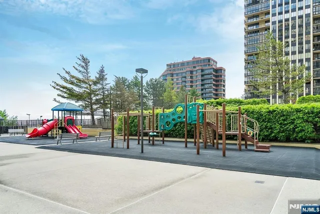 a bunch of flowers in front of a building