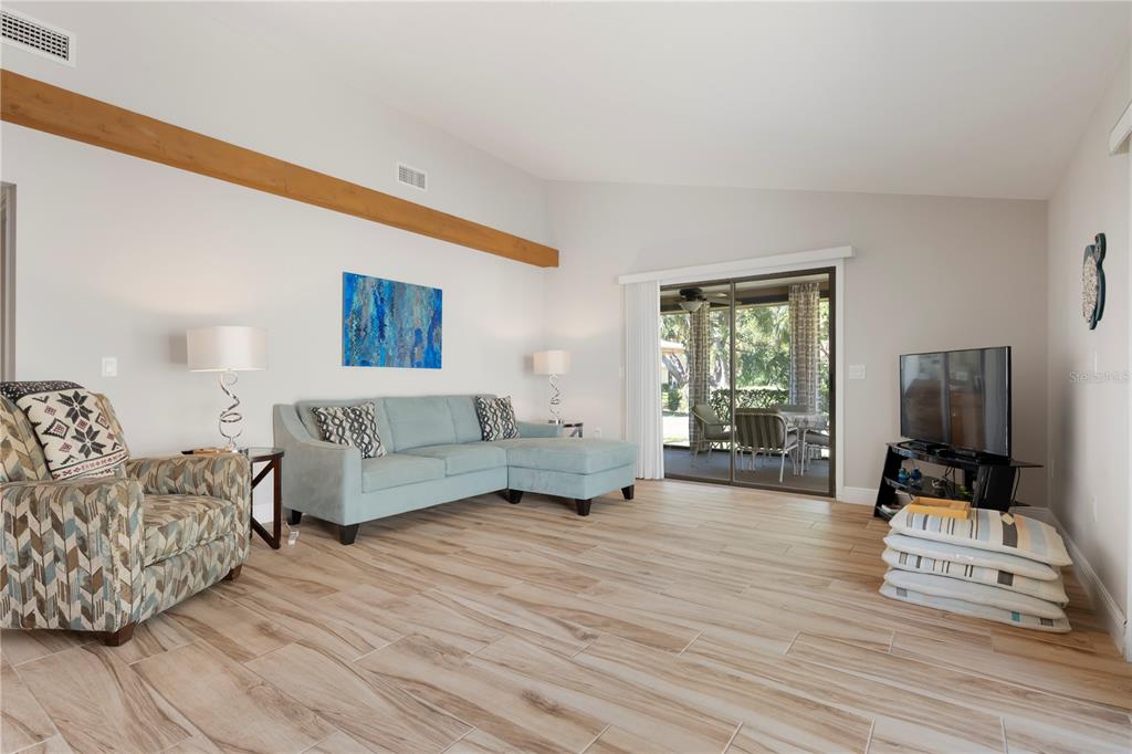 3804 Sun Eagle Lane Bradenton, FL 34210 - Photo 20 of 55 a bedroom with furniture and a flat screen tv