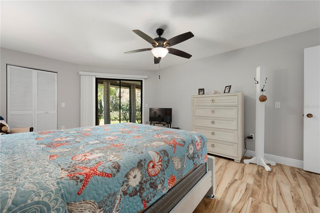 3804 Sun Eagle Lane Bradenton, FL 34210 - Photo 27 of 55 a bedroom with a bed and a window