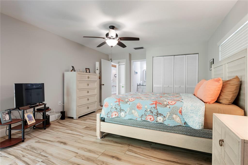 3804 Sun Eagle Lane Bradenton, FL 34210 - Photo 28 of 55 a bedroom with furniture and a flat screen tv