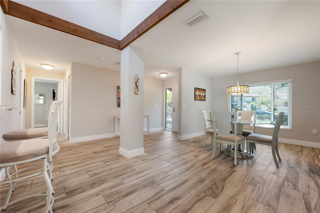 3804 Sun Eagle Lane Bradenton, FL 34210 - Photo 9 of 55 a view of a livingroom with furniture and wooden floor