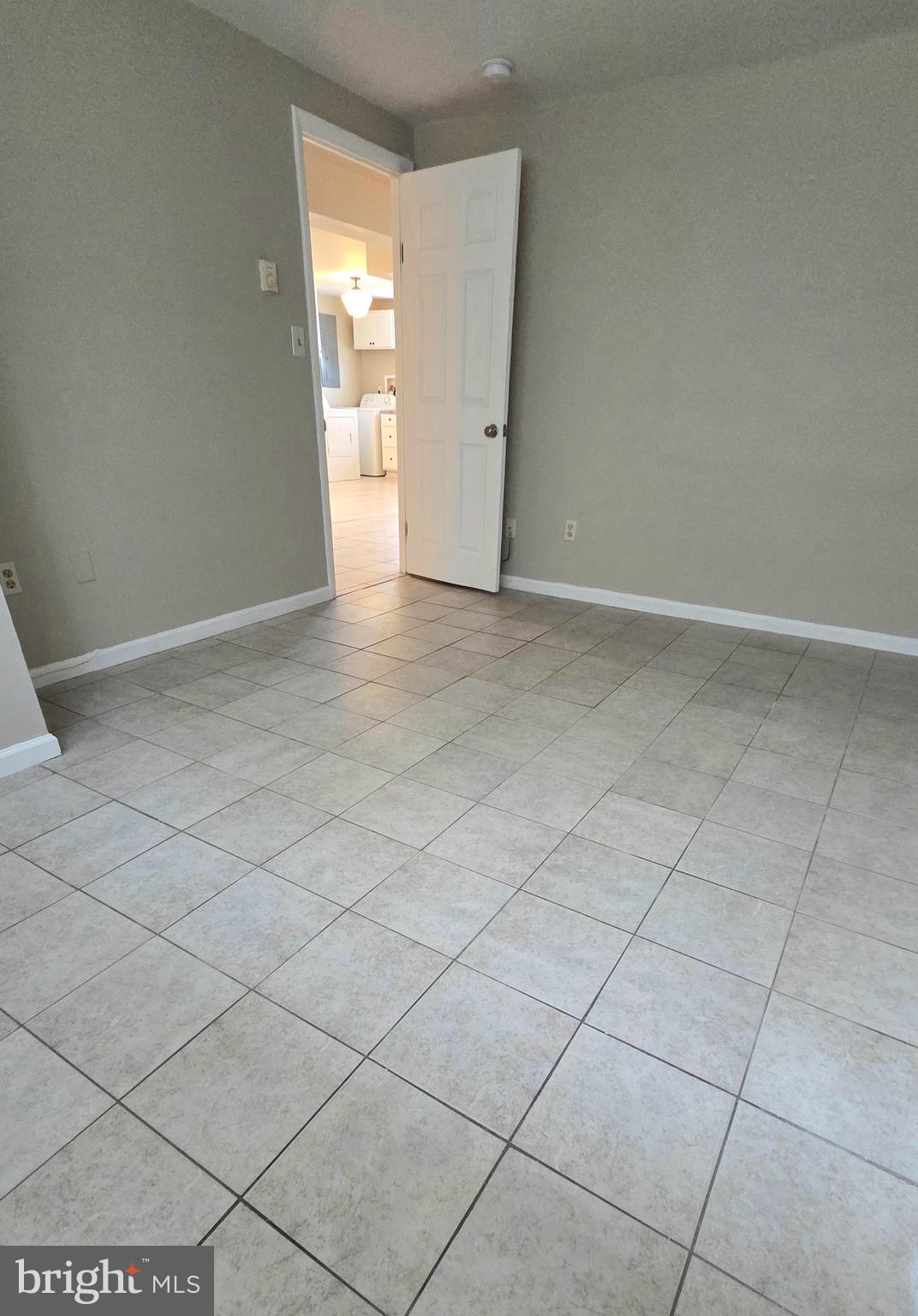 4400 4th Street Baltimore, MD 21225 - Photo 15 of 25 wooden floor in a empty room