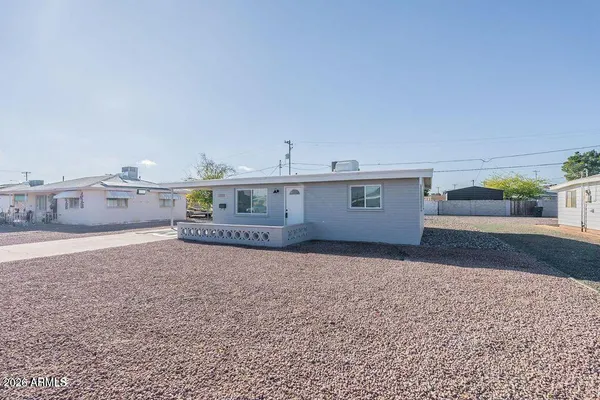 a kitchen with stainless steel appliances a refrigerator stove and sink