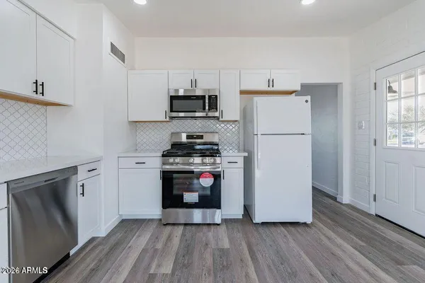 a close view of a sink and a vanity in the bathroom