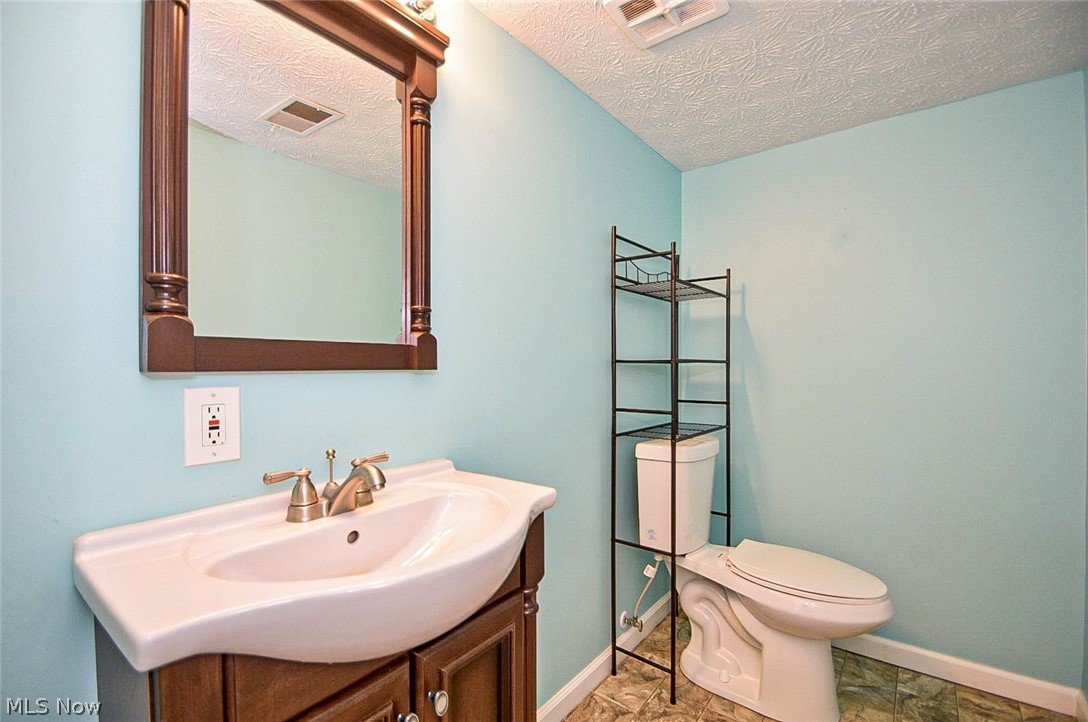 2203 Pontius Road Mogadore, OH 44260 - Photo 23 of 35 2203 Pontius Rd, Mogadore, OH 44260 Powder Room on lower level