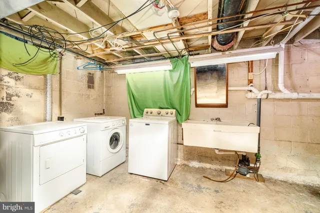 a utility room with a washer and dryer