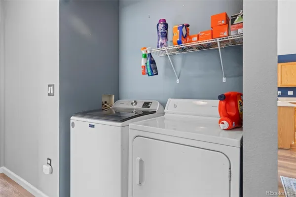 a utility room with dryer and washer