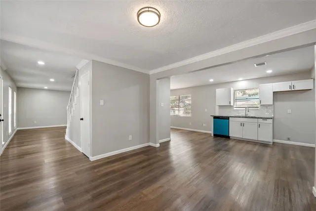 a view of kitchen with wooden floor