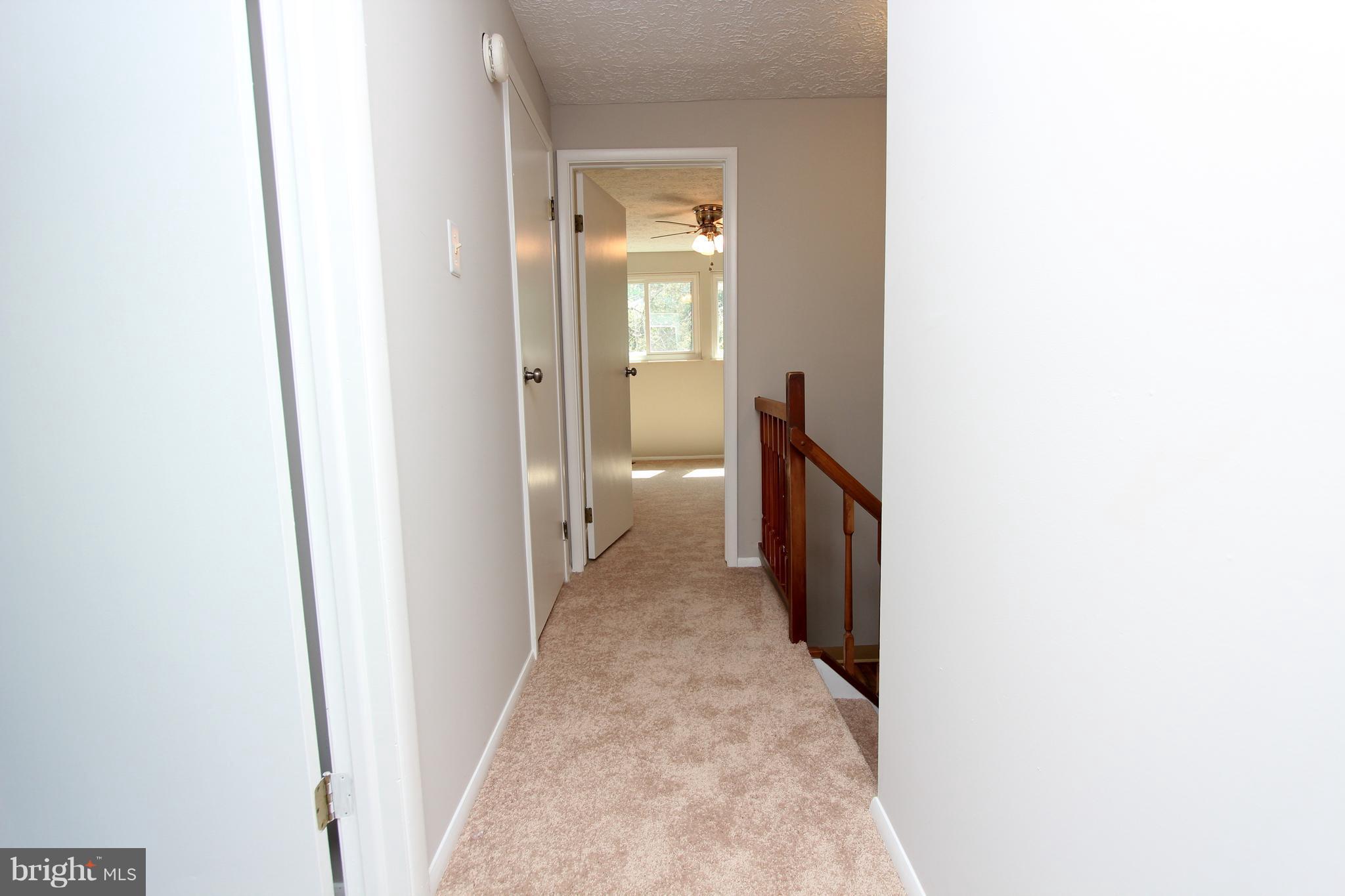 8757 Newington Commons Road Lorton, VA 22079 - Photo 14 of 20 Upper level hallway