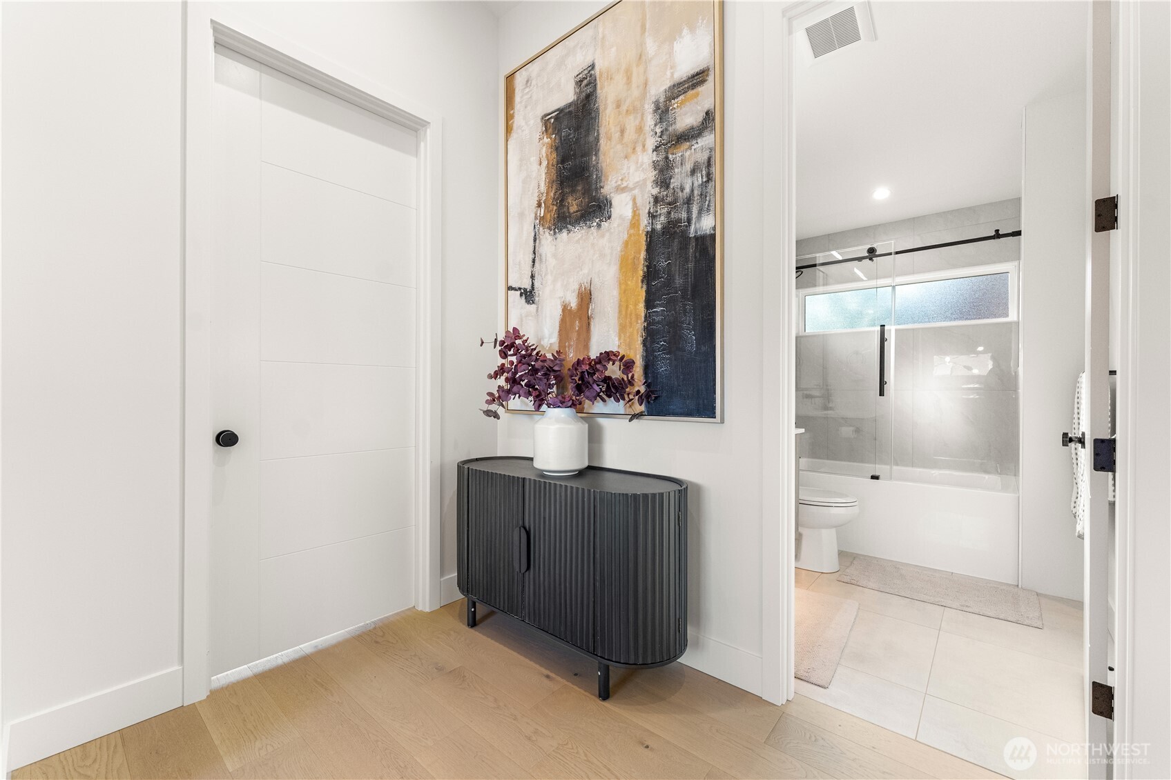 509 North 78th Street Seattle, WA 98103 - Photo 15 of 37 a bathroom with a tub and shower