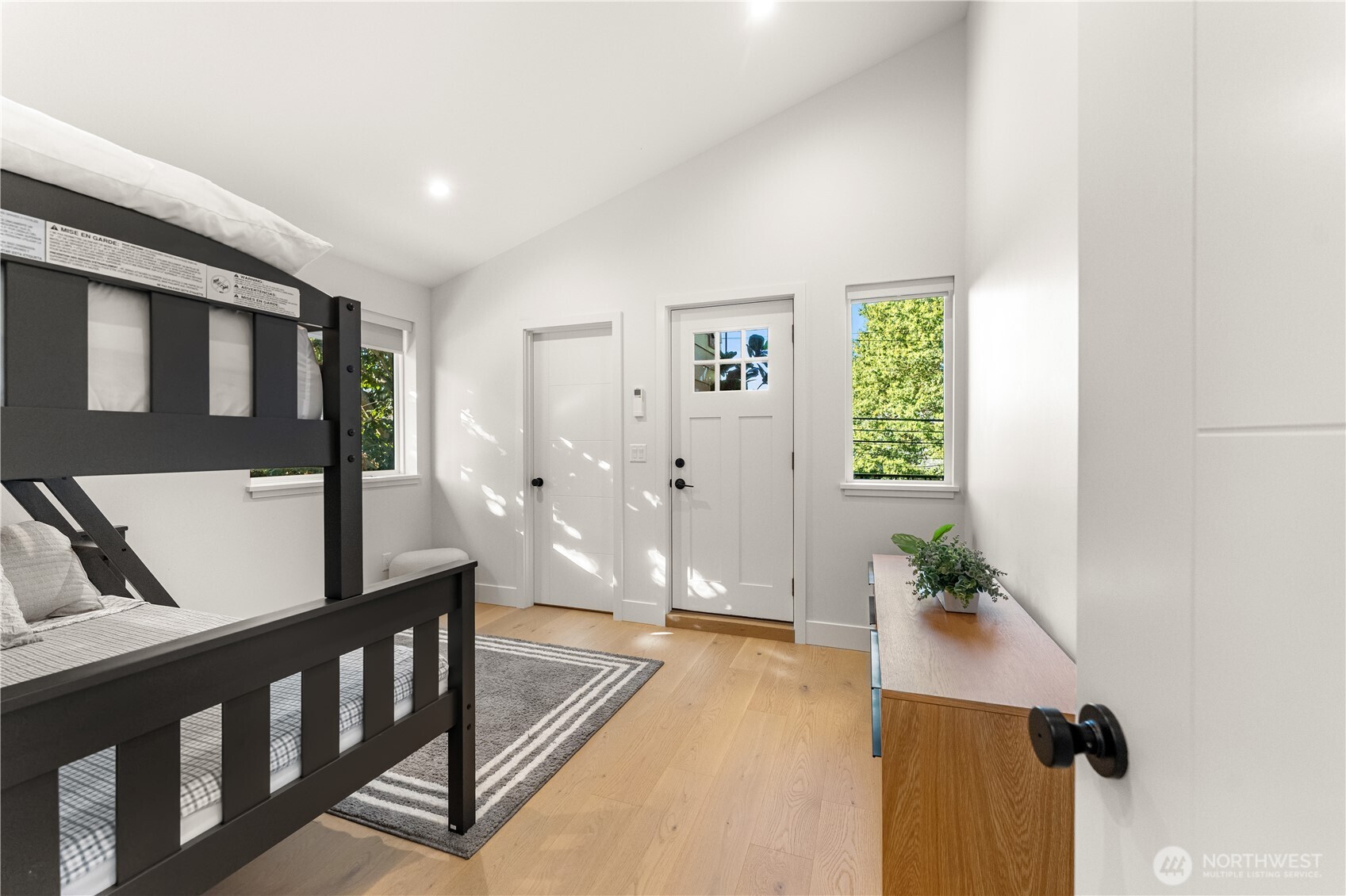 509 North 78th Street Seattle, WA 98103 - Photo 27 of 37 a view of an entryway with wooden floor