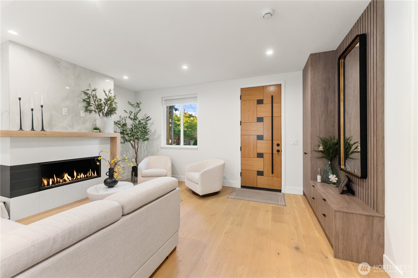 509 North 78th Street Seattle, WA 98103 - Photo 3 of 37 a living room with furniture and a fireplace