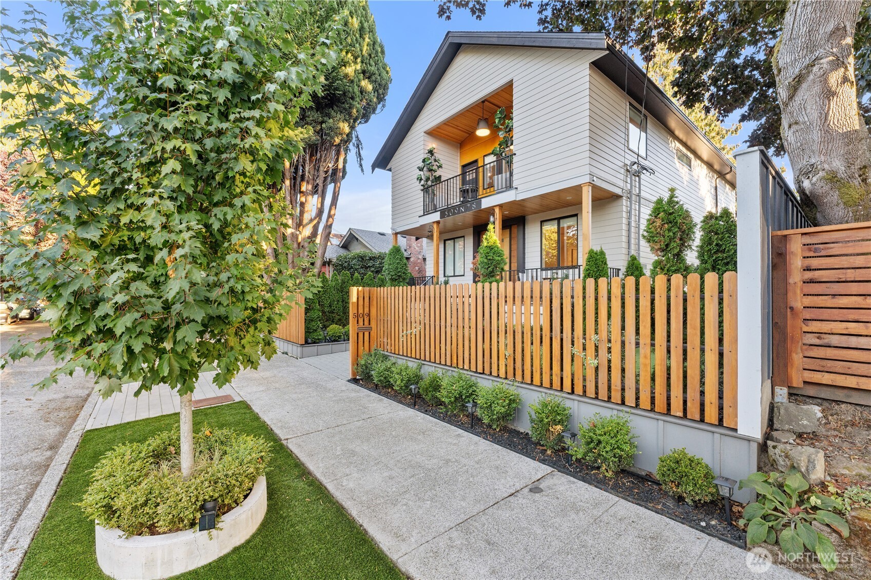 509 North 78th Street Seattle, WA 98103 - Photo 35 of 37 a front view of a house with a yard