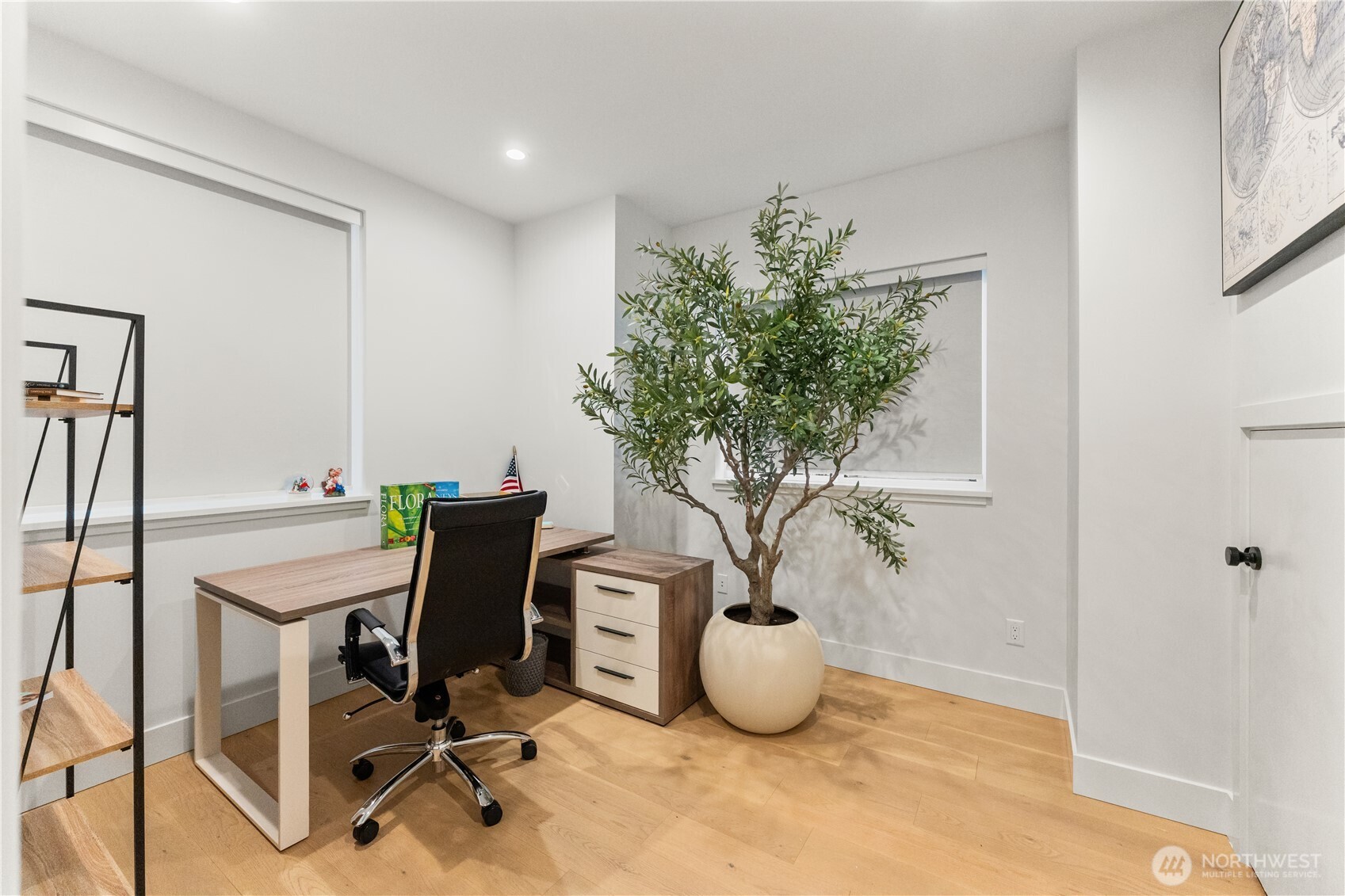 509 North 78th Street Seattle, WA 98103 - Photo 4 of 37 a view of a dining room with furniture and a potted plant