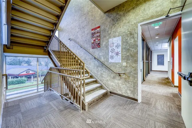 a view of room with window and furniture