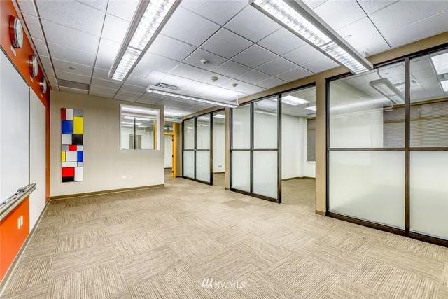a view of an empty room with a window