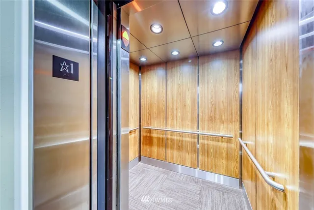 a view of a livingroom with a staircase