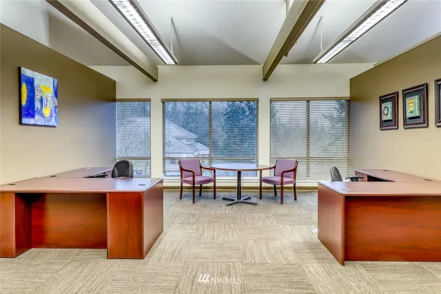 a kitchen with a sink and a refrigerator