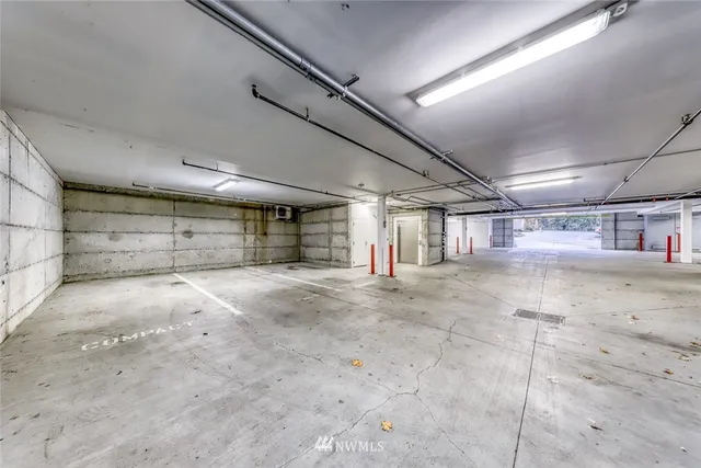 a porch with a table and chairs