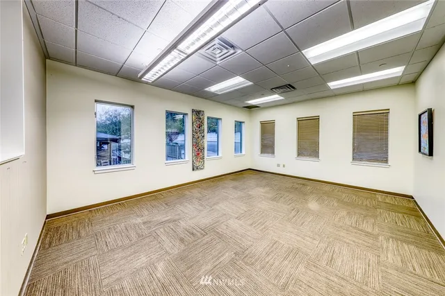 a view of an empty room with a window