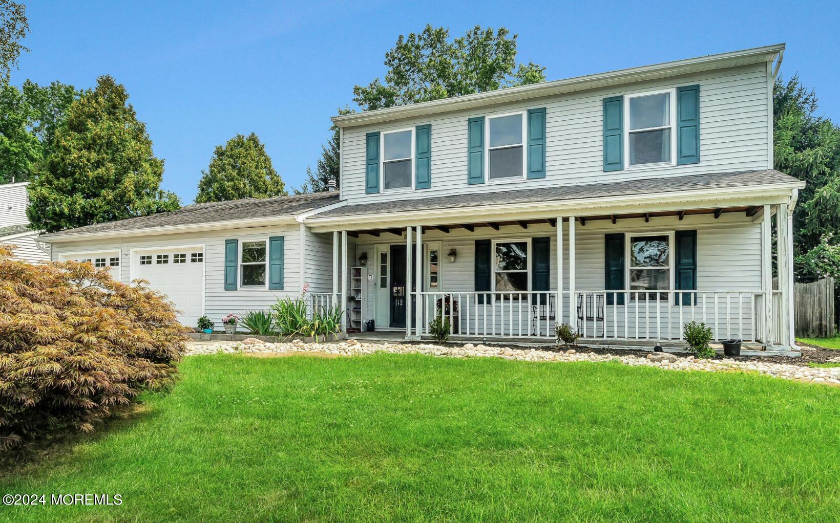 38 Starlight Road Howell, NJ 07731 - Photo 2 of 49 front view of a house with a yard