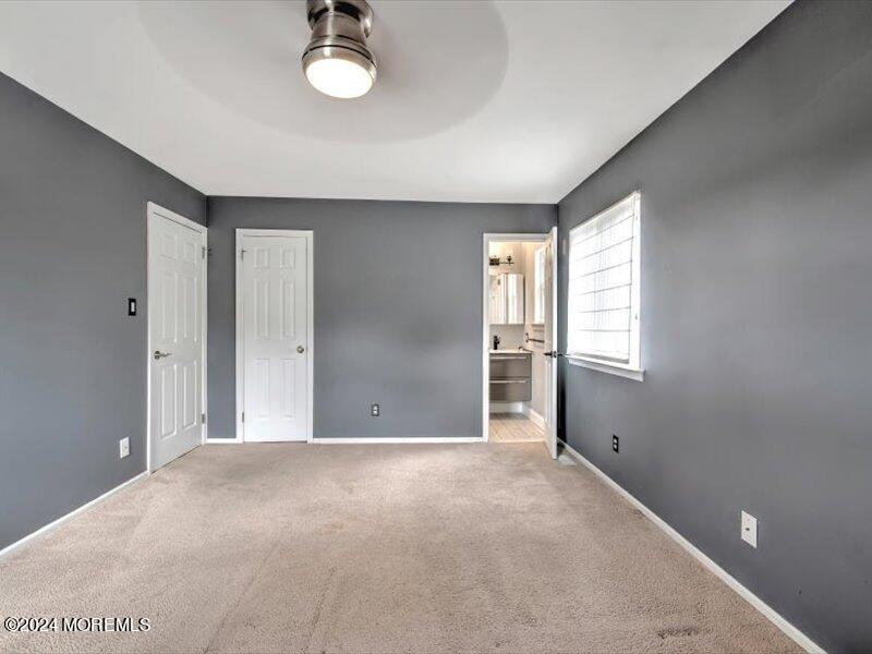 38 Starlight Road Howell, NJ 07731 - Photo 30 of 49 a view of an empty room with a window