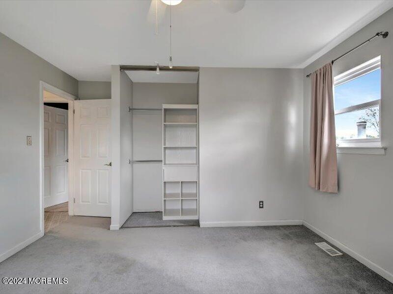 38 Starlight Road Howell, NJ 07731 - Photo 36 of 49 an empty room with closet and windows