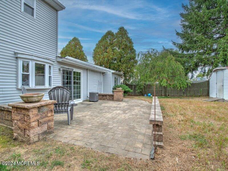 38 Starlight Road Howell, NJ 07731 - Photo 41 of 49 a house view with a sitting space and garden space
