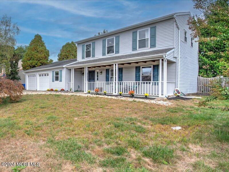 38 Starlight Road Howell, NJ 07731 - Photo 49 of 49 a front view of a house with a yard