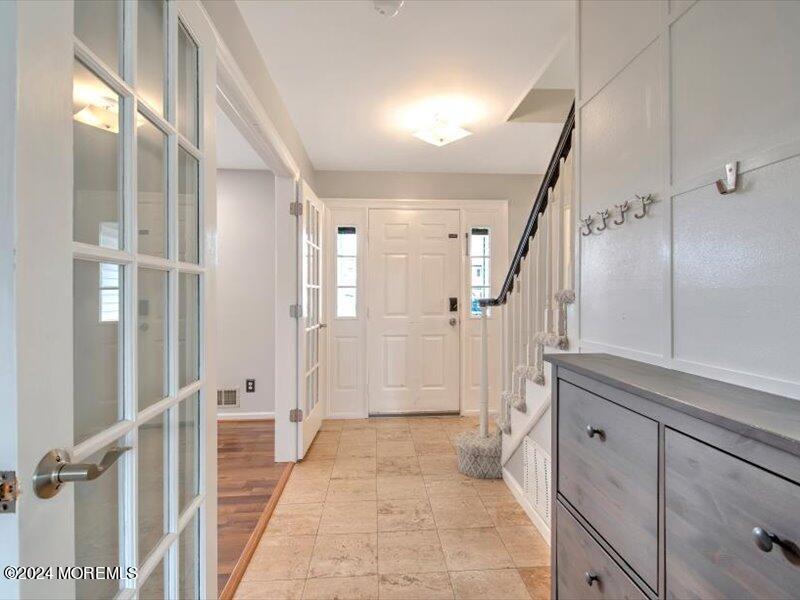 38 Starlight Road Howell, NJ 07731 - Photo 8 of 49 a bathroom with a glass door shower a sink and a mirror