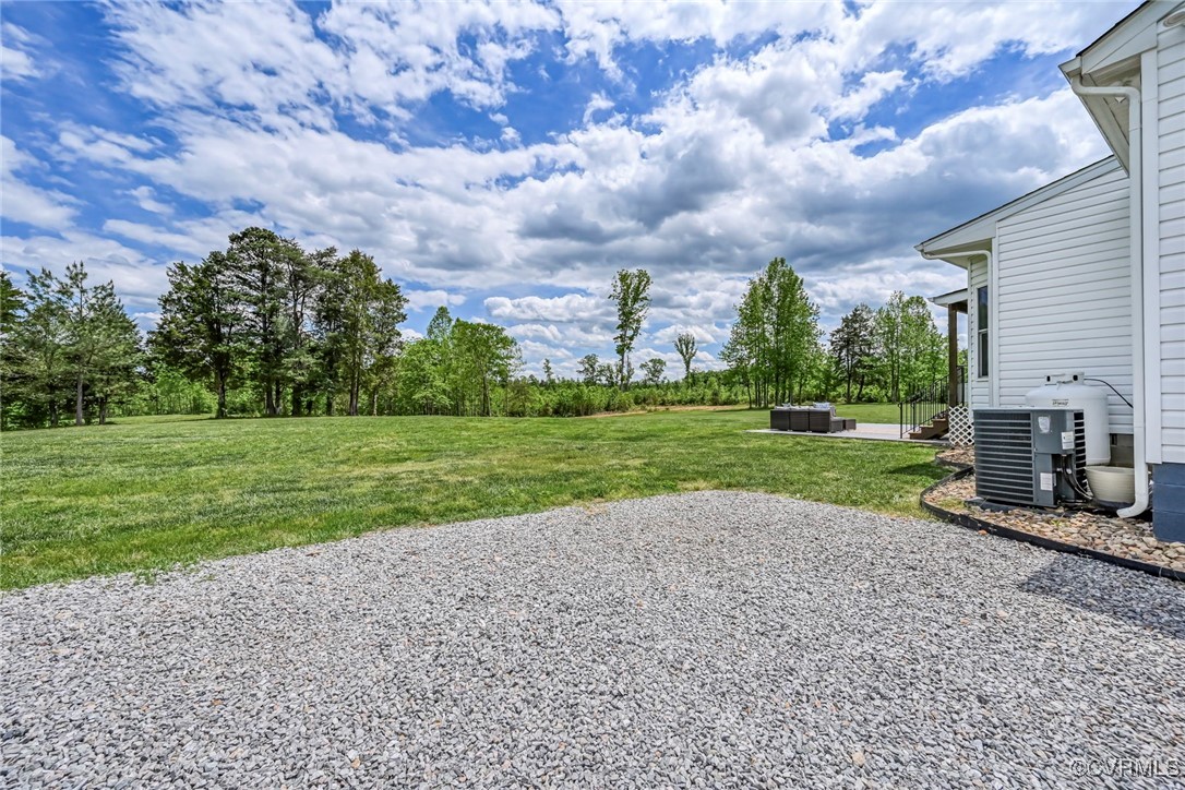 16093 Union Church Road Beaverdam, VA 23015 - Photo 3 of 42 Rear view of house with an outdoor hangout area, c