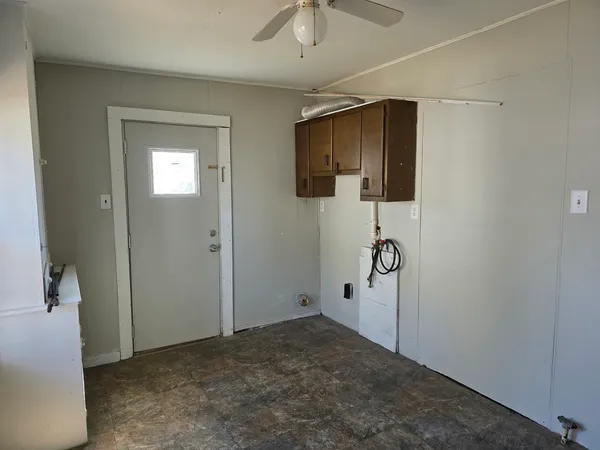 a view of a hallway with closet