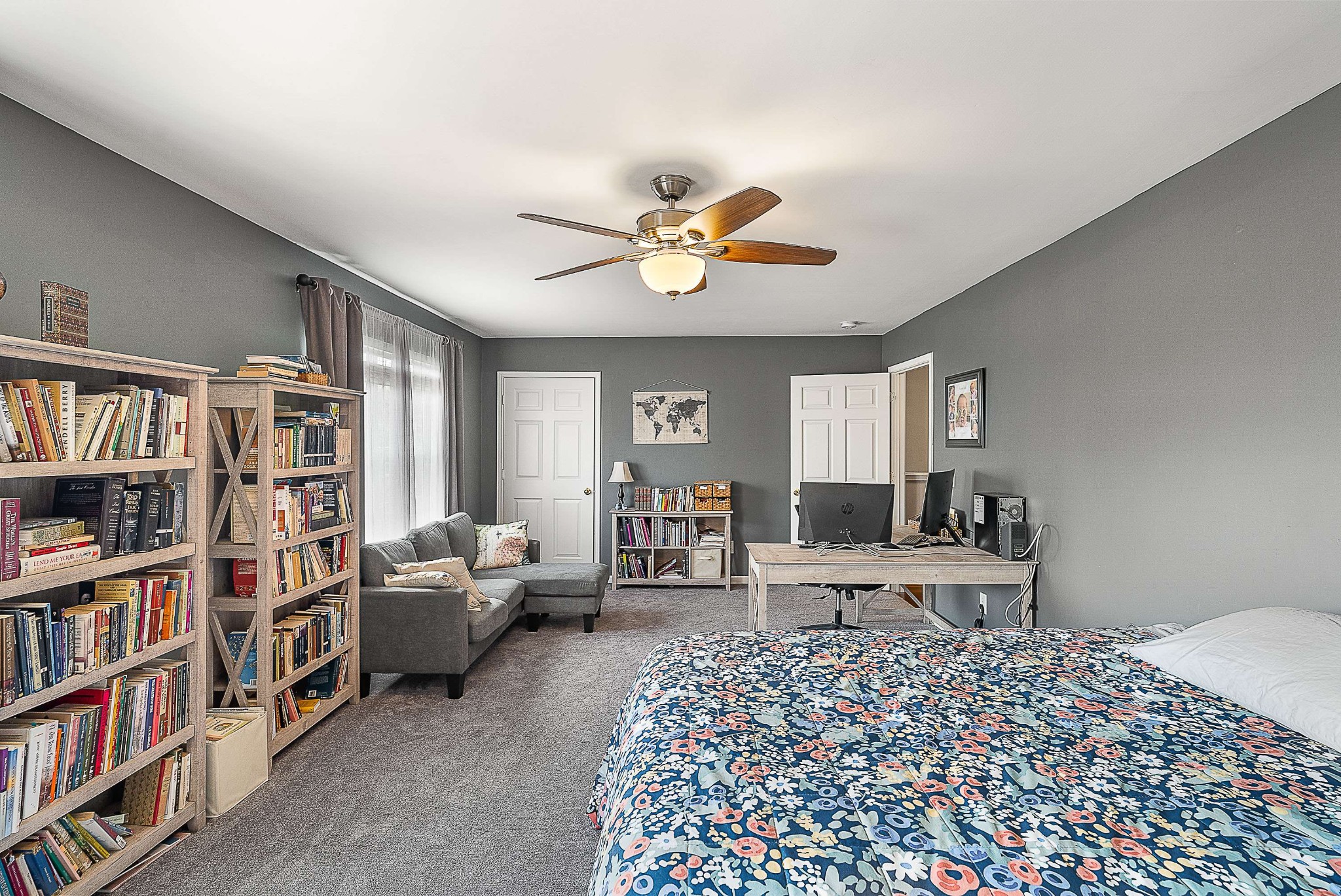 7211 Rye Court Fairview, TN 37062 - Photo 14 of 34 a living room with a couch and a book shelf