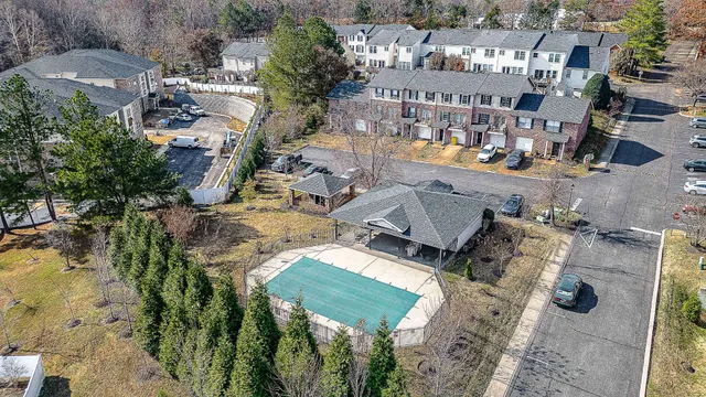 an aerial view of a houses with outdoor space