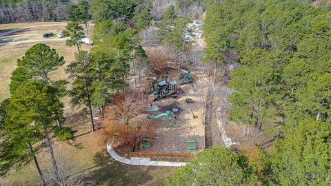 a view of a garden with a fountain