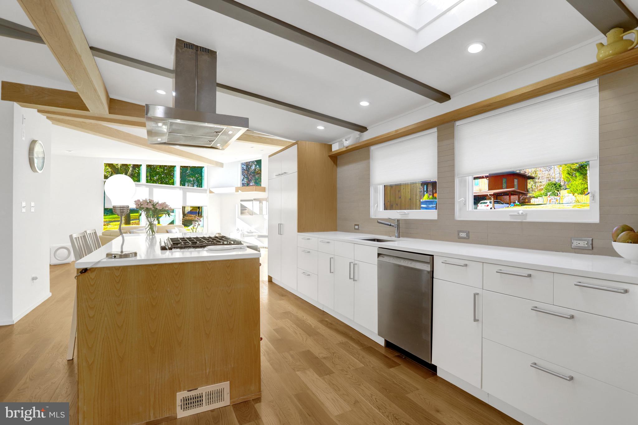 3017 Pine Spring Road Falls Church, VA 22042 - Photo 13 of 62 a kitchen with stainless steel appliances granite countertop a sink and a stove