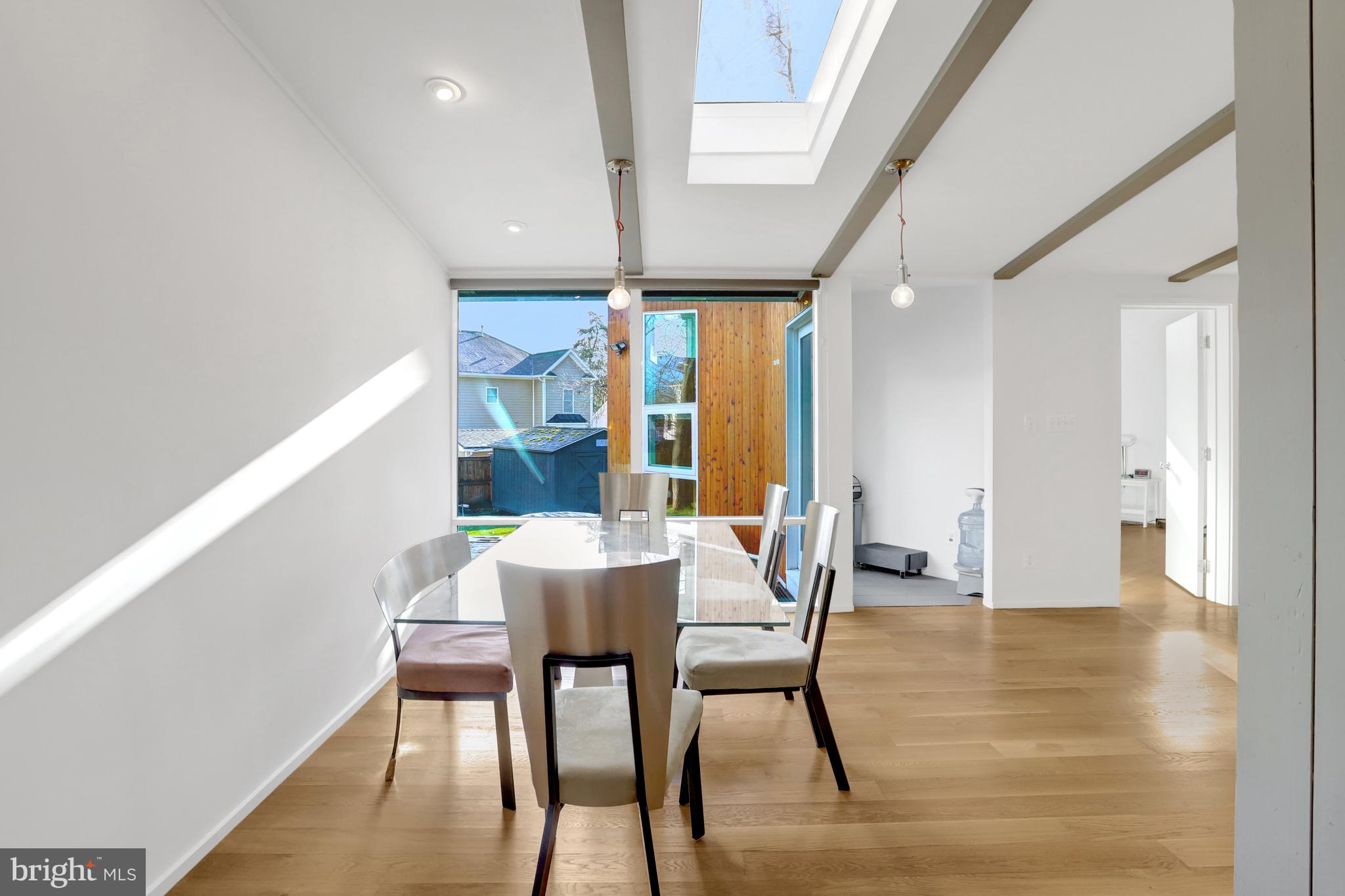 3017 Pine Spring Road Falls Church, VA 22042 - Photo 21 of 62 a view of a dining room with furniture and wooden floor