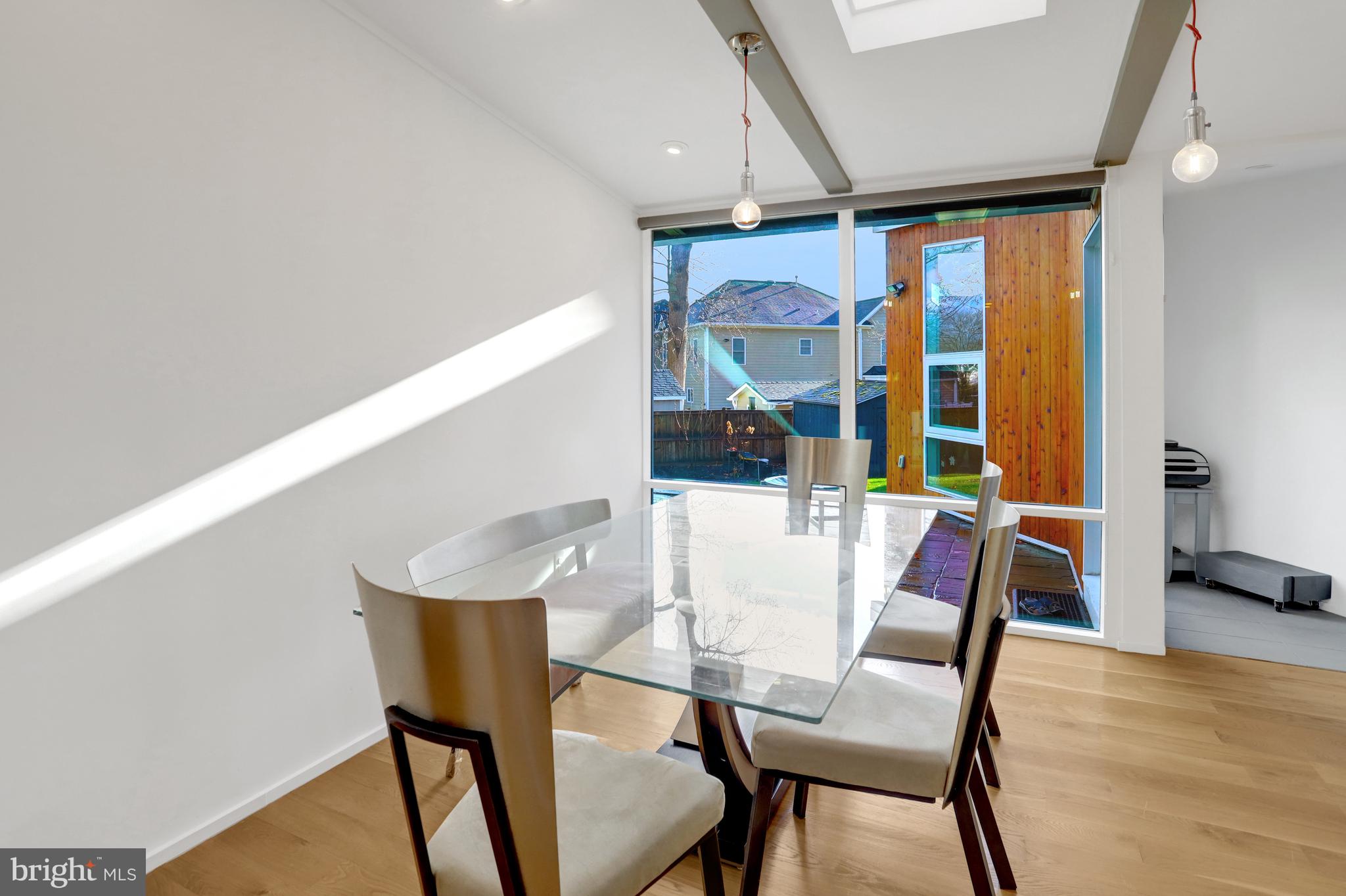 3017 Pine Spring Road Falls Church, VA 22042 - Photo 23 of 62 a view of a dining room with furniture and wooden floor