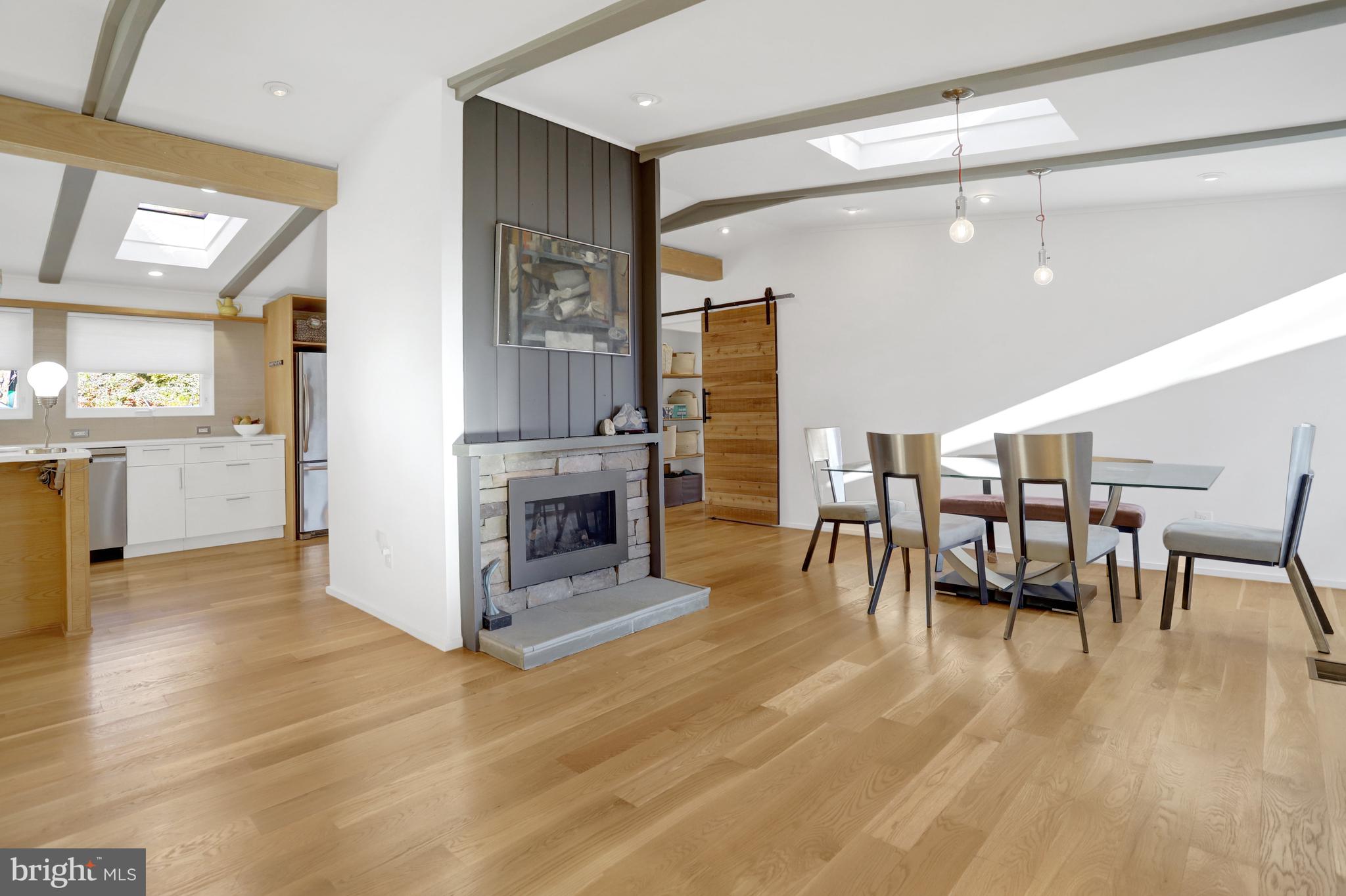3017 Pine Spring Road Falls Church, VA 22042 - Photo 24 of 62 a living room with fireplace and wooden floor