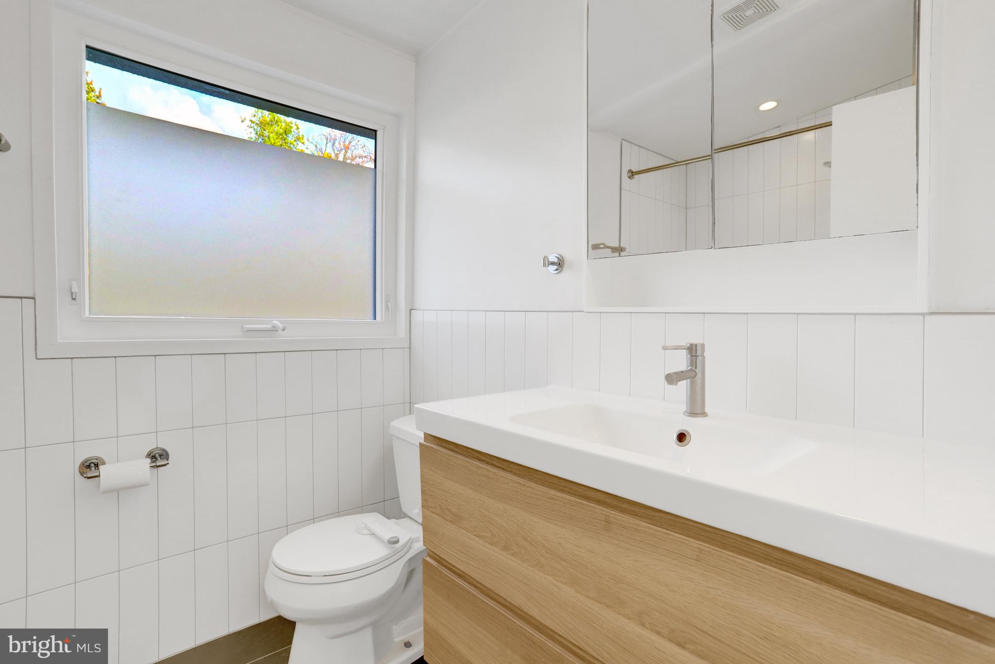 3017 Pine Spring Road Falls Church, VA 22042 - Photo 34 of 62 a bathroom with a sink and a toilet