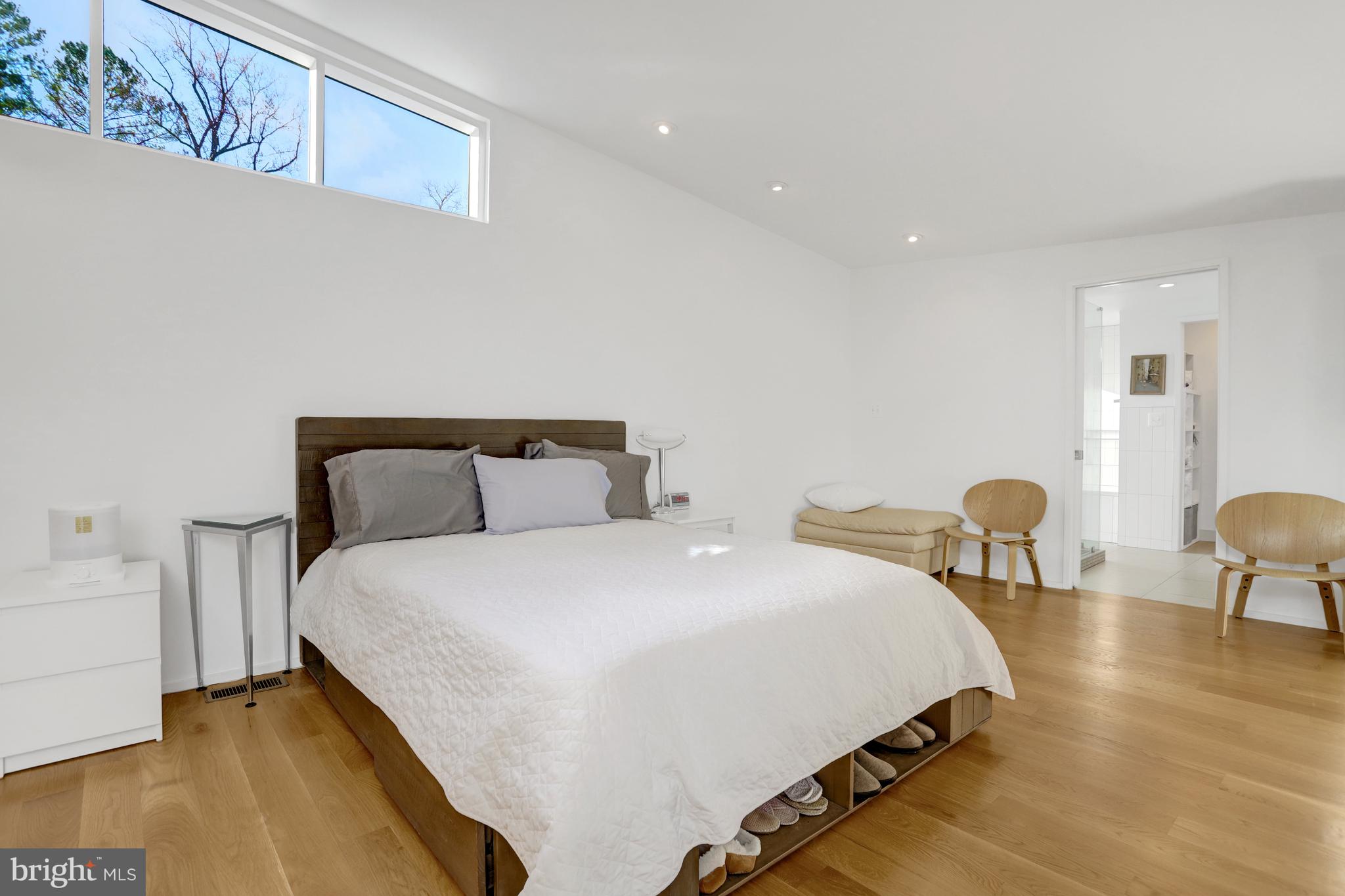 3017 Pine Spring Road Falls Church, VA 22042 - Photo 41 of 62 a bedroom with bed and chair